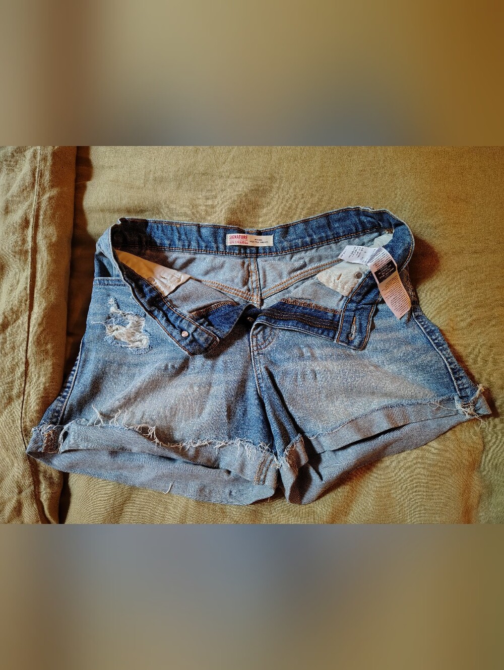 Levi's Light Blue Distressed Denim Cutoff Shorts